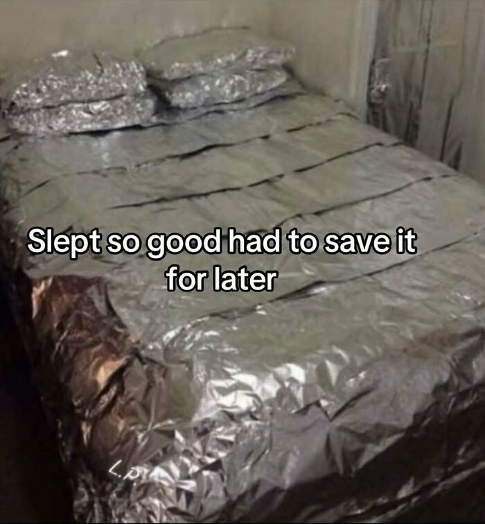 Bed and pillows wrapped entirely in aluminum foil with text about saving good sleep for later, nerdy memes humor.