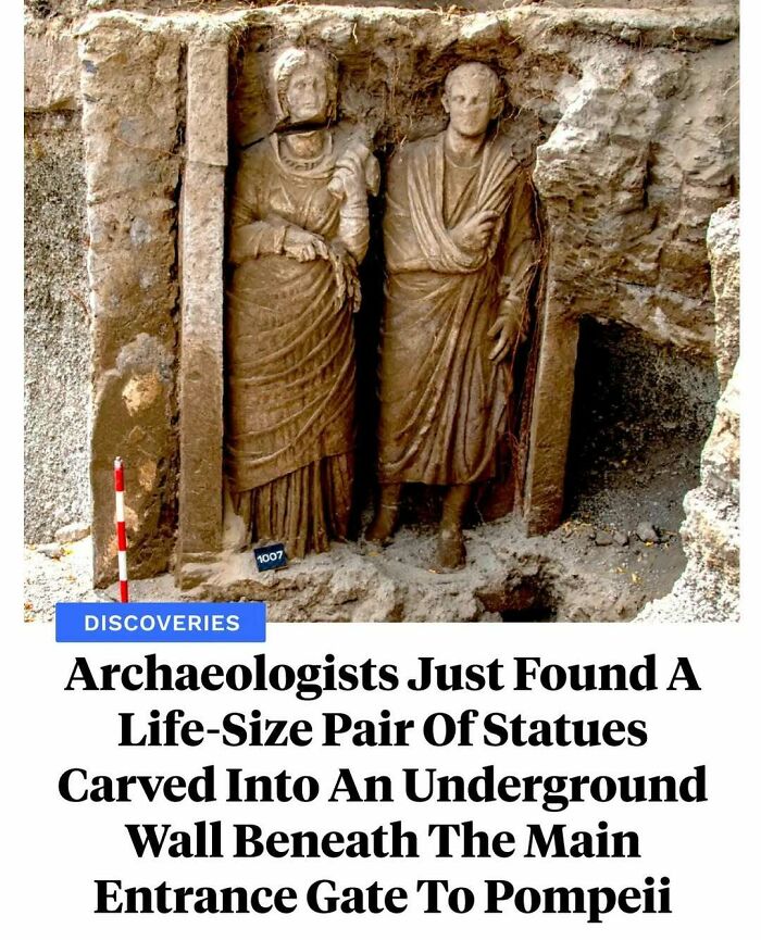 Life-size statues carved into an underground wall discovery in Pompeii, showcasing interesting facts from archaeology.