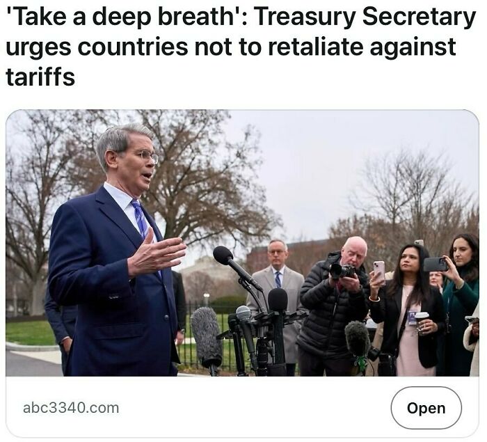Treasury Secretary speaking outdoors to reporters urging countries not to retaliate against tariffs in a serious interaction.