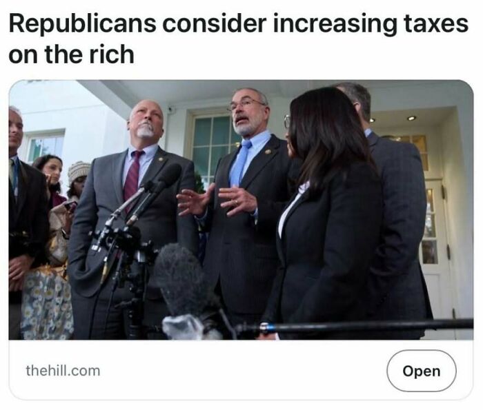 Politicians speaking at a press conference about taxes on the rich, highlighting headlines that could pass for satire.
