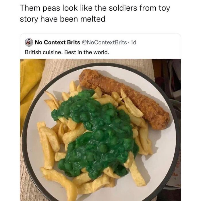 Plate of chips, mushy peas, and a battered sausage humorously representing British cuisine in funny memes about life in the UK.