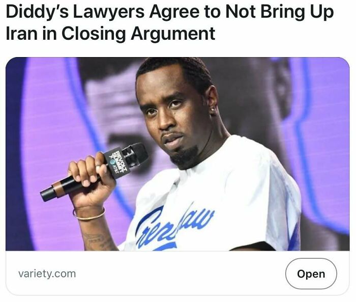 Man holding a microphone with a serious expression, illustrating satire headlines that are unfortunately true.