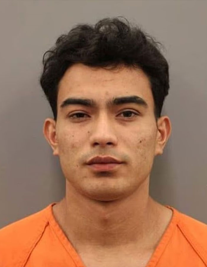 Mugshot of a young man in an orange jumpsuit related to trafficking victim being dragged to captivity case. Mugshot of a young man in an orange jumpsuit related to trafficking victim being dragged to captivity case.