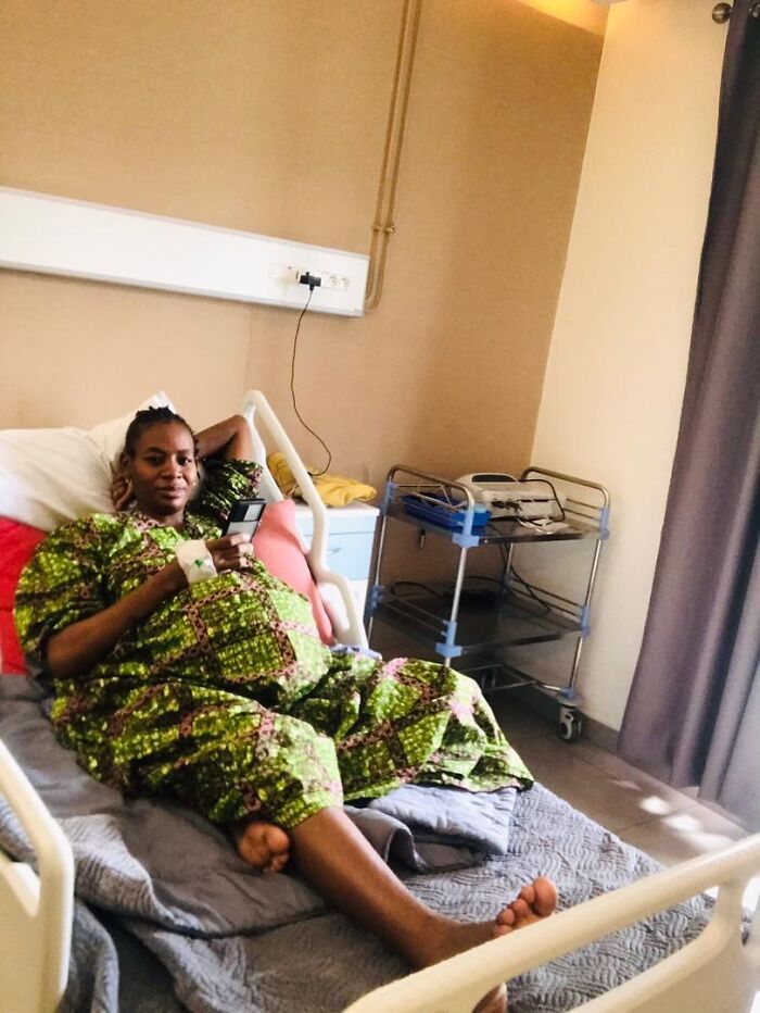 Pregnant woman resting in hospital bed, preparing for the world&rsquo;s first surviving nonuplets birth and their fast growth.