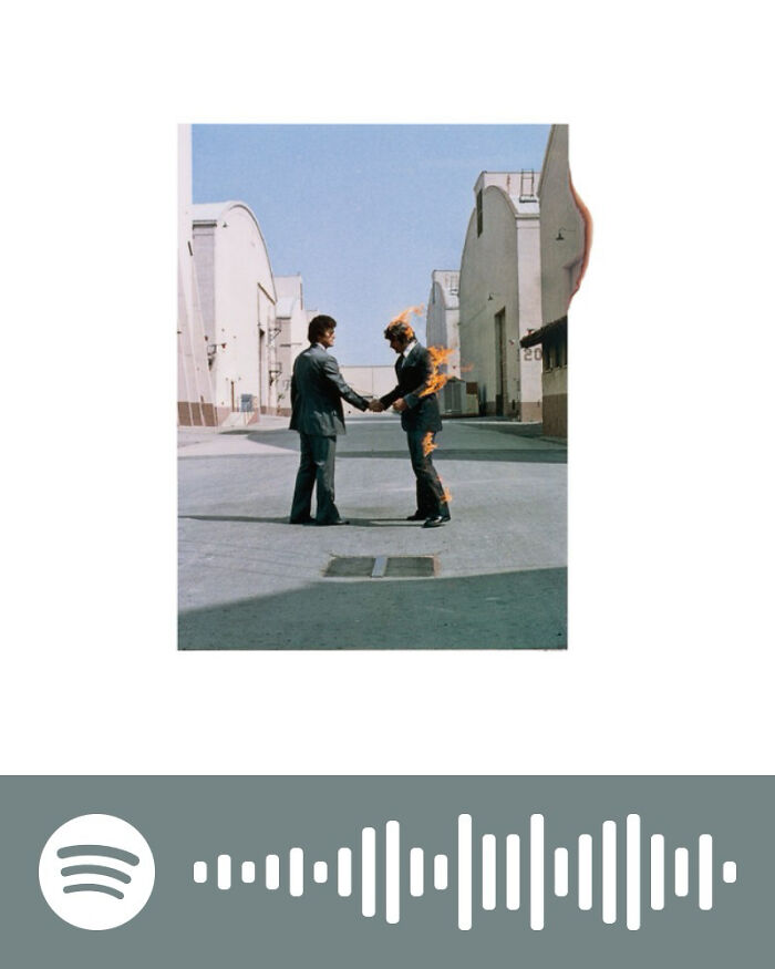 Album cover art of two men shaking hands, one on fire, representing songs that hurt so good in music playlists.