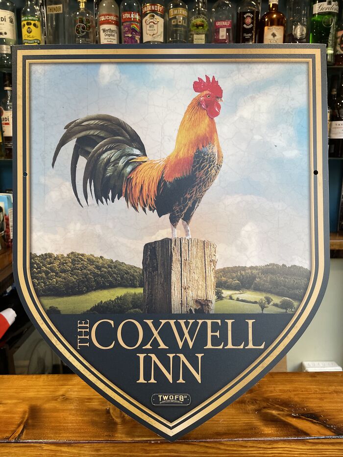 The Country Roaster On A Post