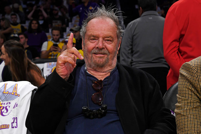 Jack Nicholson at a basketball game, responding to fan concerns about his health after a frail appearance.