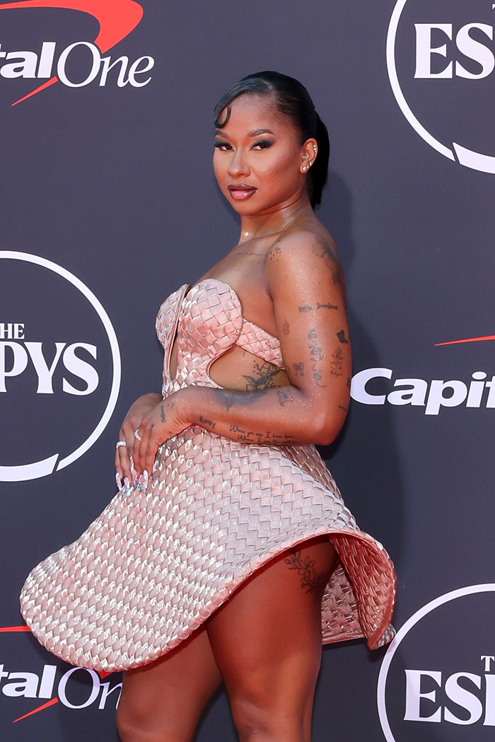 Jordan Chiles posing on the red carpet in a tiny pink frock at the 2025 ESPYs, a worst dressed sports star look.