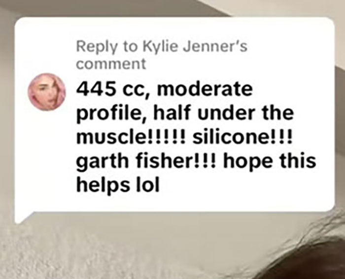 Text message reply mentioning 445 cc silicone implants and plastic surgery details related to Kylie Jenner's scar.