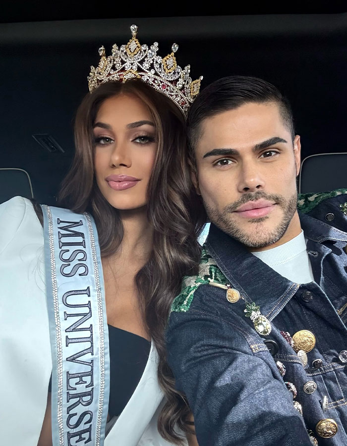 Miss Universe Cuba winner wearing crown and sash, posing with a man in a denim jacket, nepo baby controversy highlighted.