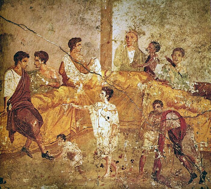 Ancient fresco depicting a group of people in discussion, related to Singapore experienced mass panic over shrinking genitals.