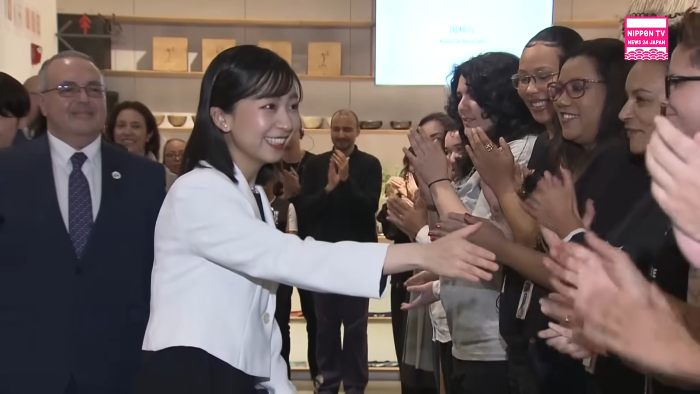 Japanese Princess Kako greeting people and going viral after being spotted asleep in economy class on a flight.