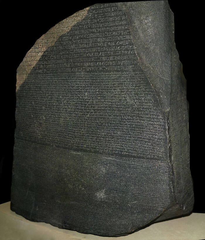 Rosetta Stone, one of the foreign artifacts held in the British Museum, featuring ancient inscriptions in multiple scripts.