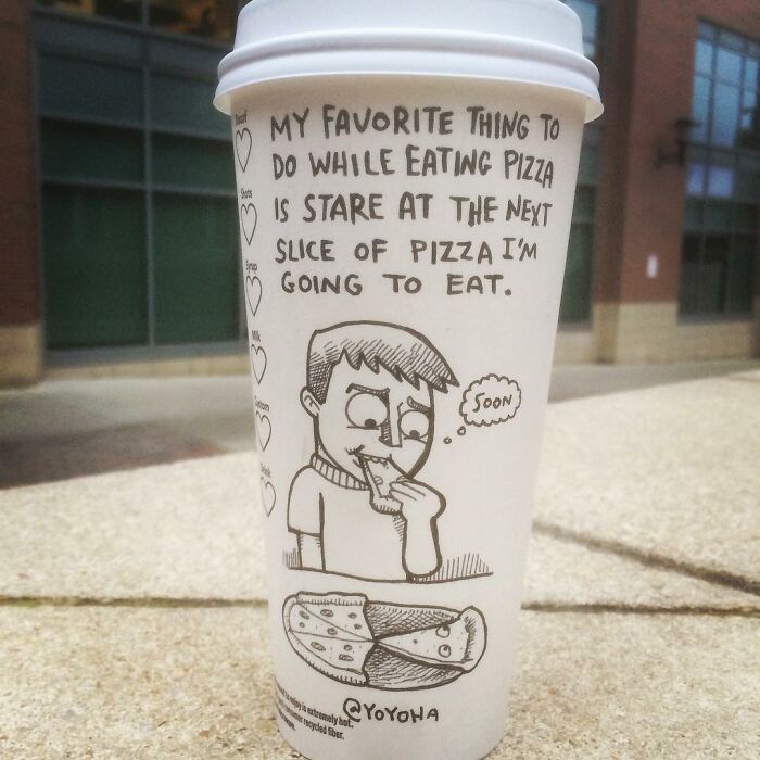 Coffee cup with a humorous cartoon about pizza, showcasing relatable art on coffee cups by an imaginative artist.