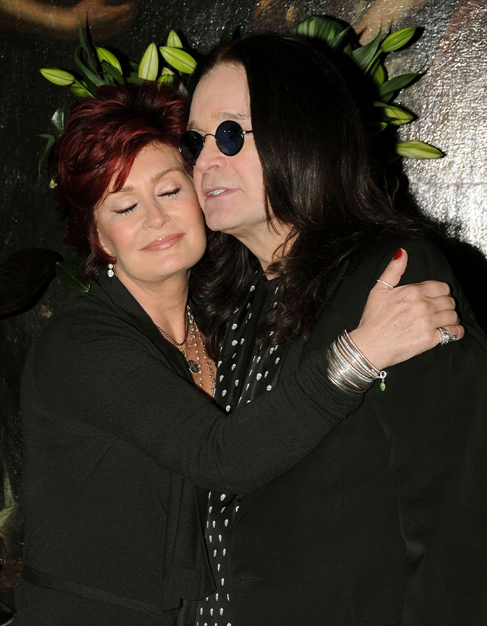 Sharon Osbourne embracing Ozzy Osbourne, showing their close bond before his passing in a heartfelt moment. - 1