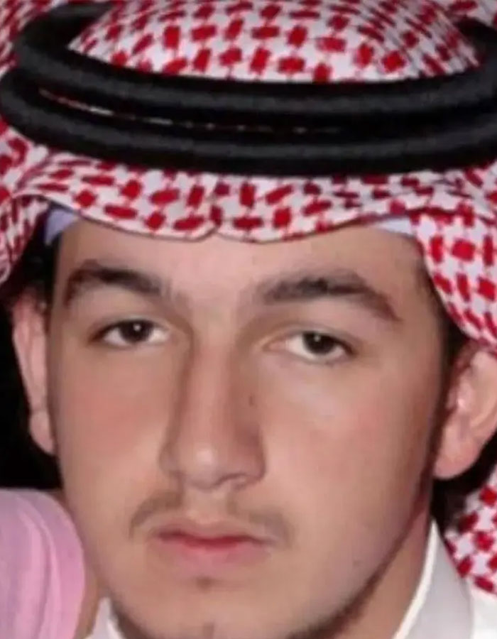 Close-up of a young man wearing traditional Saudi headwear, representing the Sleeping Prince of Saudi Arabia. Close-up of a young man wearing traditional Saudi headwear, representing the Sleeping Prince of Saudi Arabia.