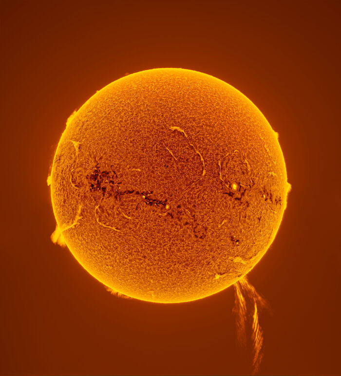 Close-up detailed view of the sun capturing solar flares and surface texture in stunning space photography.