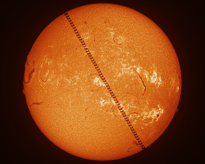 Detailed close-up shot of the sun showcasing solar flares and sunspots from breathtaking space photos collection.