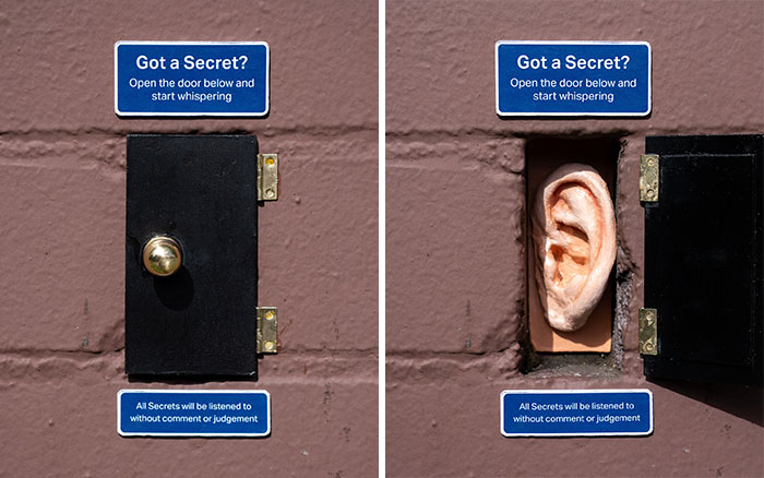 Funny tiny street scene featuring a secret door with a giant ear, inviting people to whisper in the city.