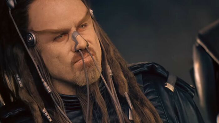 Actor in a sci-fi scene from one of the worst movies, highlighting the hall of shame for bad films.