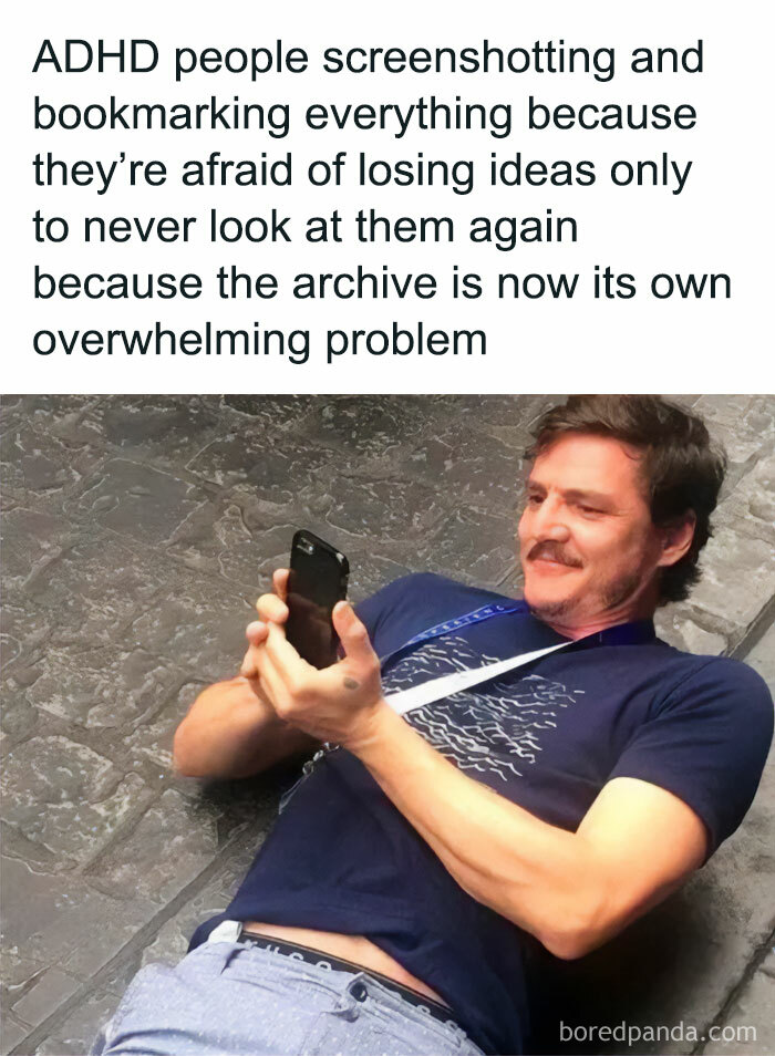 Man lying on the ground smiling and taking a photo on phone illustrating neurodivergents with ADHD relatable behavior.