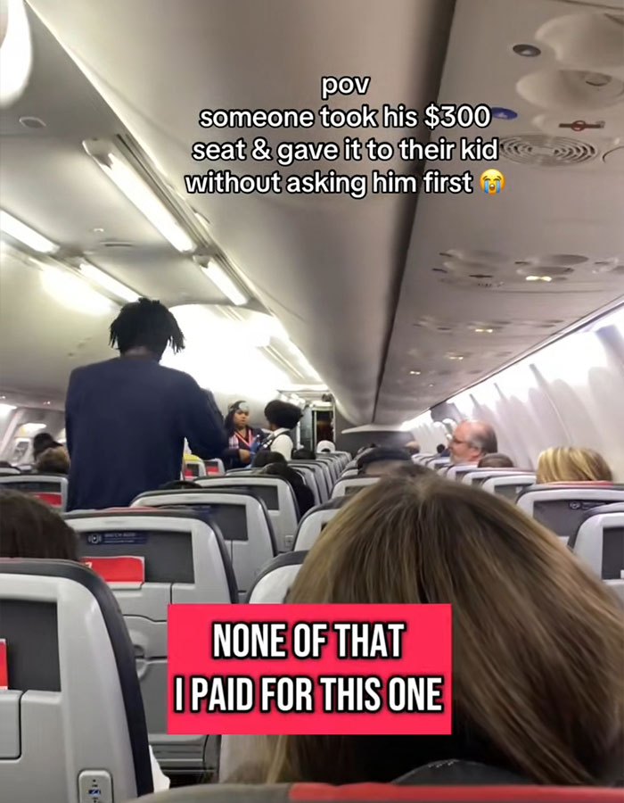 Plane passenger upset as child sits on his $300 seat without consent inside airplane cabin. Plane passenger upset as child sits on his $300 seat without consent inside airplane cabin.