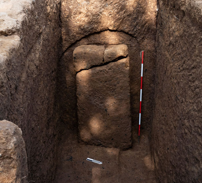 Ancient 2,600-year-old tomb uncovered in Italy showing a mysterious burial chamber during archaeological excavation.