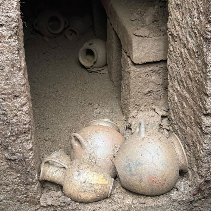 Ancient pottery inside a 2,600-year-old tomb in Italy&rsquo;s burial chamber uncovered by archaeologists.