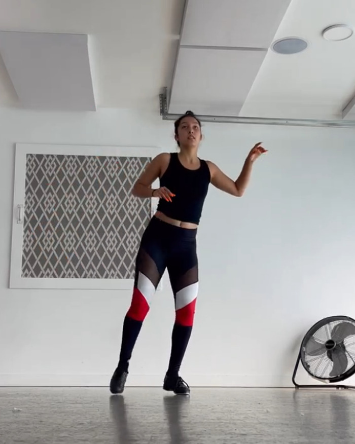 Shiloh Jolie-Pitt, 19, wearing sporty outfit dancing indoors, fueling romance rumors with new public outing.