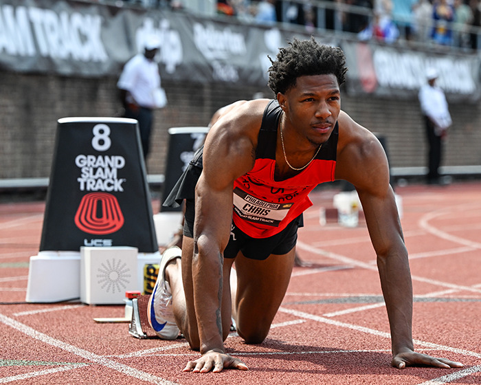 Sprinter in starting position on track during race, known for viral moment landing modeling offers. Sprinter in starting position on track during race, known for viral moment landing modeling offers.