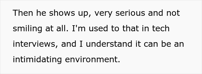 Candidate arrives serious and nervous for job interview, showing signs of pressure in an intimidating environment.