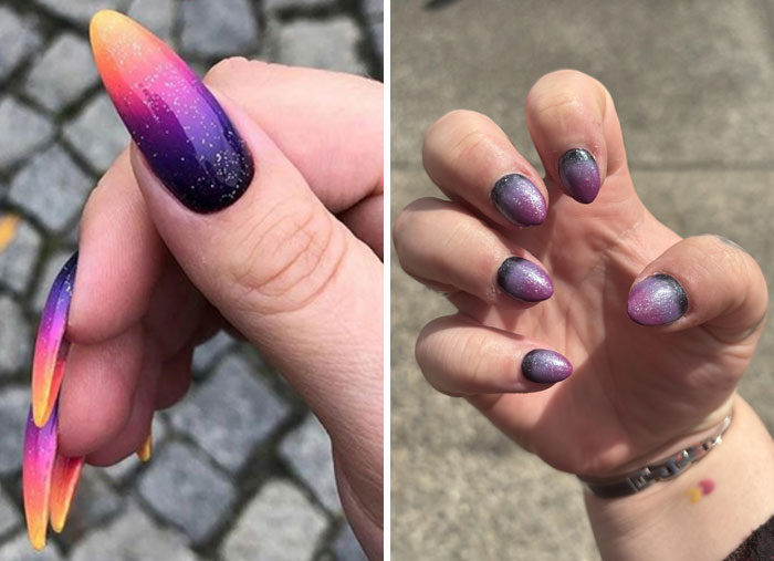 Close-up of hands showing gradient purple and pink nails with a glow-up design from a salon experience.