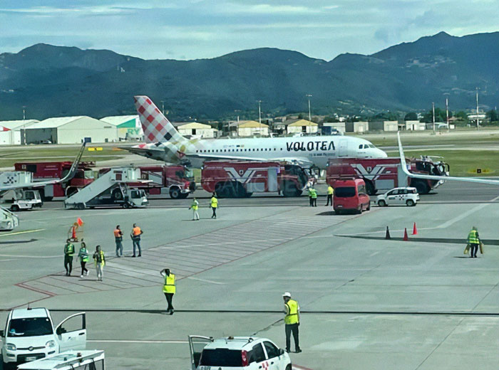 Airport emergency response near Volotea plane after man sucked into plane engine incident, friends break silence on troubled mind.