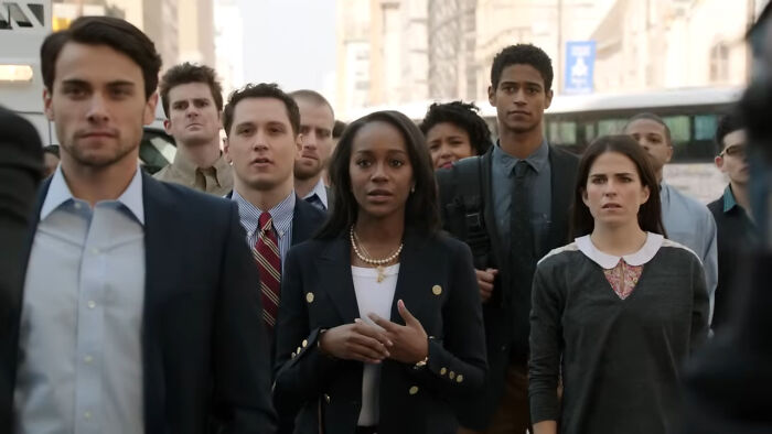 A diverse group of people walking outside, representing fans of the best Netflix shows that keep viewers coming back. - 18