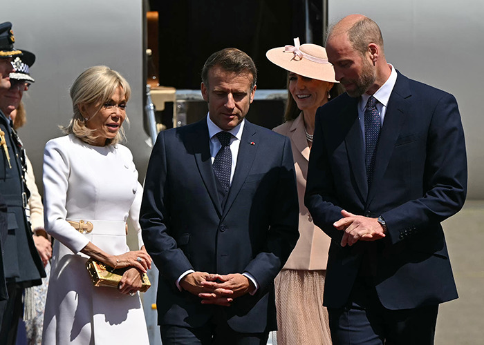 Brigitte Macron displaying cold behavior towards husband Emmanuel Macron during UK visit with British royals.