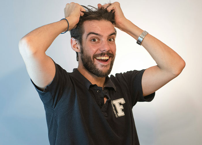Man with beard and black shirt showing frustration, illustrating men brutally honest about what they never tell women. - 40