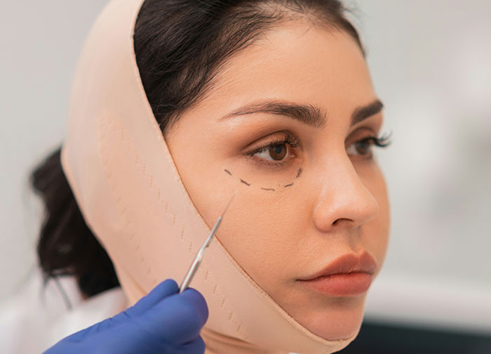 Woman with facial markings for cosmetic surgery consultation, highlighting beauty and appearance concerns related to men’s honesty. - 6