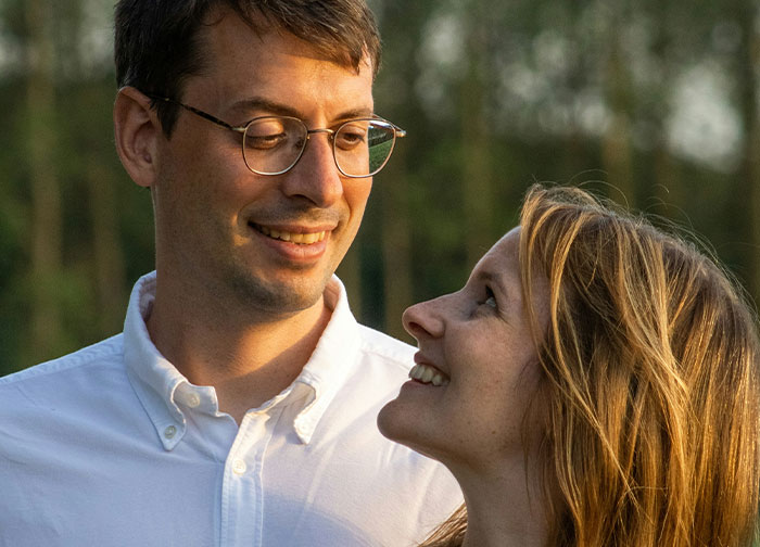 Couple outdoors with the man getting brutally honest and sharing thoughts men never tell women about appearance and feelings. - 41