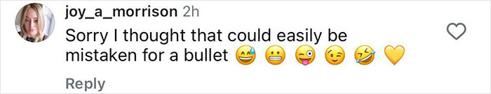 User comment on social media post, humorously comparing the bedazzled tampon to a bullet with multiple emojis.