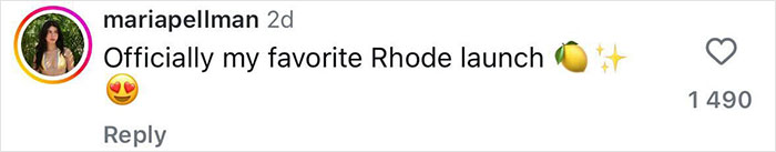 Screenshot of an Instagram comment praising the Rhode Beauty launch with emojis of a peach and sparkles.