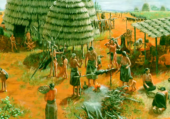 Ancient Native American village scene depicting daily life with traditional huts and community cooking fire. - 7