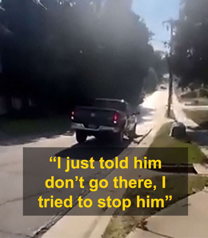 Black pickup truck near a damaged sidewalk, illustrating instant karma after ignoring sinkhole warning due to color bias.