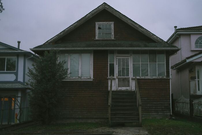 Old wooden house with stairs and windows, evoking mystery related to outrageous student names revealed by a teacher.