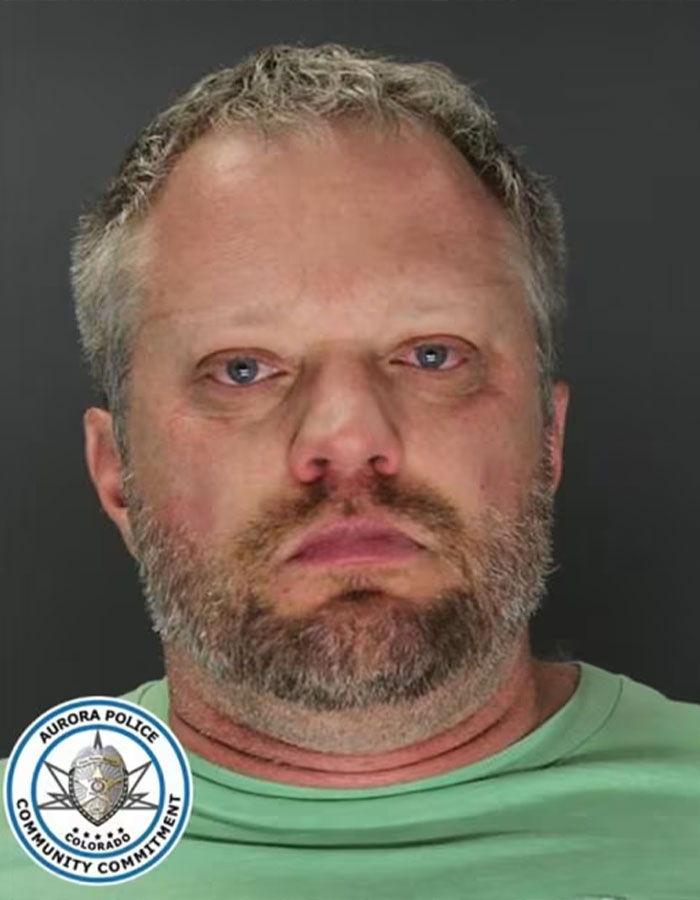 Mugshot of a man linked to Colorado dentist’s case, involving 4,000 texts before wife’s murder investigation. - 2