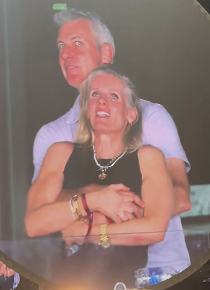 Couple embracing closely indoors, illustrating Coldplay HR executive past and elite sorority days revealed by friends.