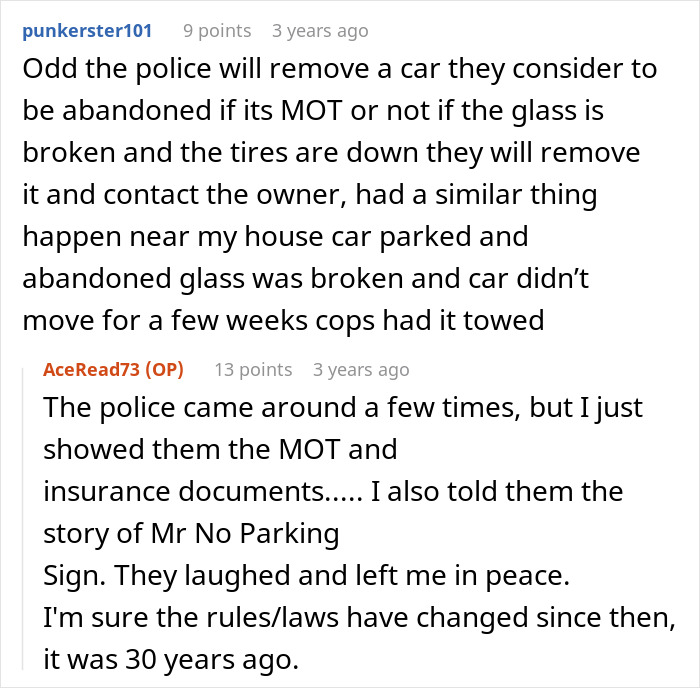 Comment discussing police towing abandoned cars and parking rules on public roads near homes.