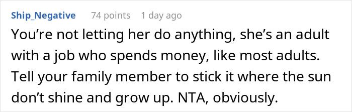 Screenshot of a Reddit comment defending a 21-year-old spending her hard-earned money on a family vacation amid family drama.