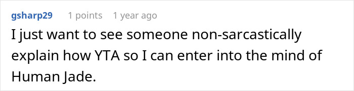 Comment on Reddit showing a user discussing a woman furious her partner won't rename their cat for her. - 46