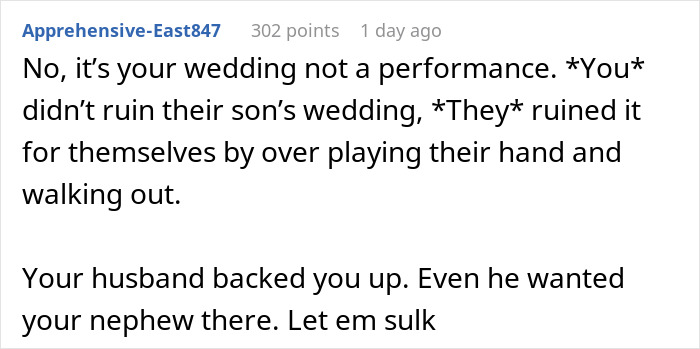 Screenshot of a Reddit comment defending a bride for not kicking out autistic nephew at wedding amid criticism. Screenshot of a Reddit comment defending a bride for not kicking out autistic nephew at wedding amid criticism.
