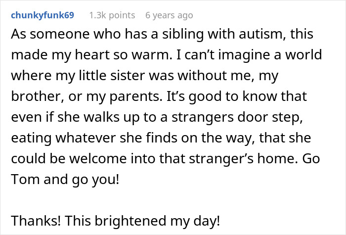 Man standing on patio with a thoughtful expression, representing autism awareness in a calm outdoor setting.